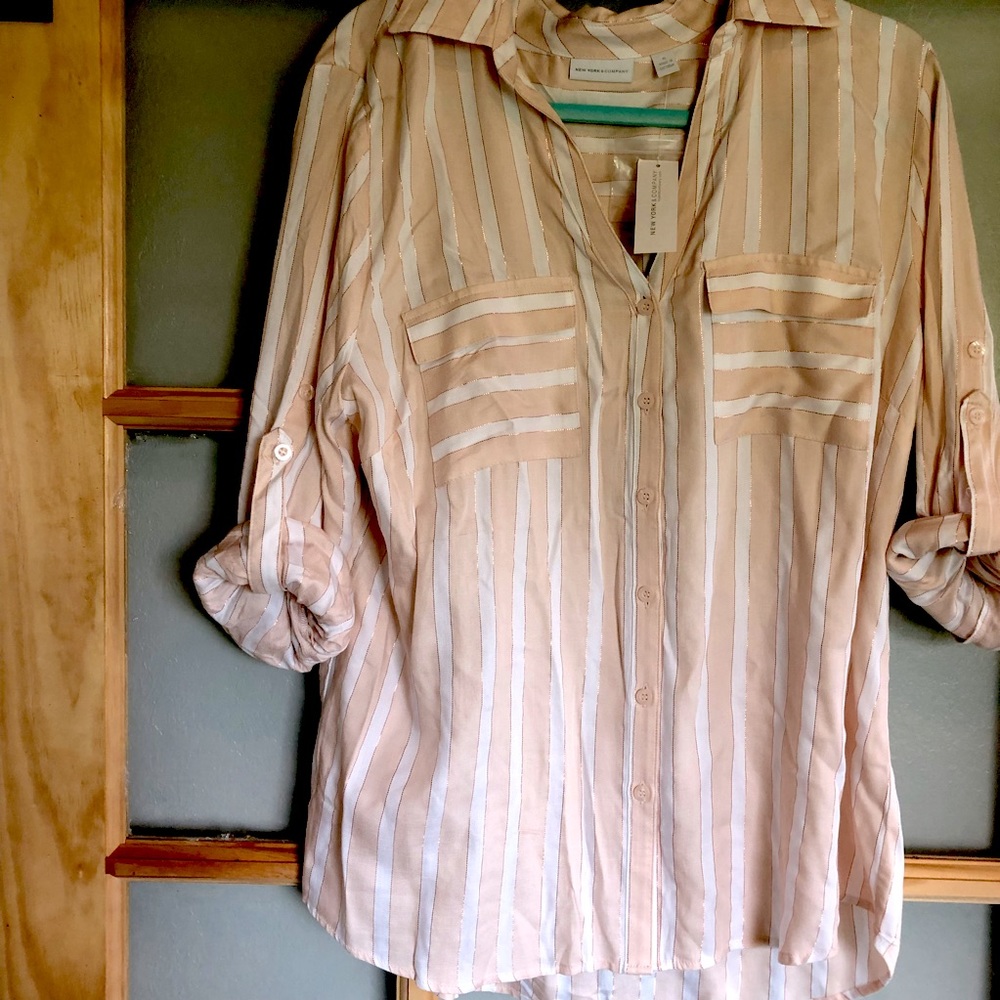Pink and white button down shirt.